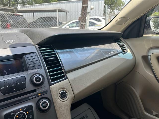 used 2015 Ford Taurus car, priced at $5,000