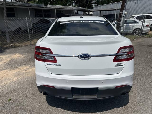 used 2015 Ford Taurus car, priced at $5,000
