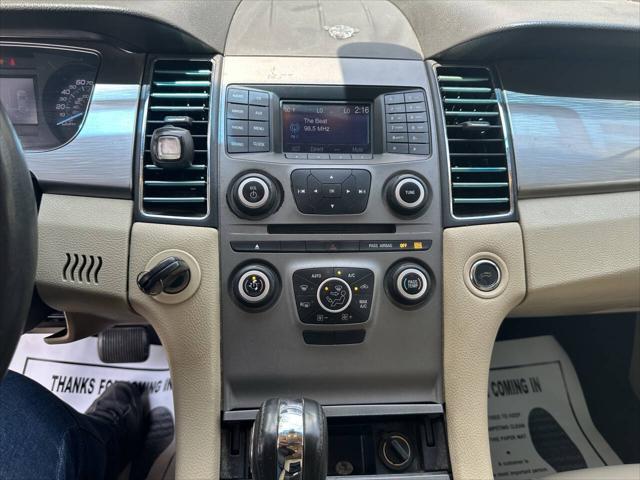 used 2015 Ford Taurus car, priced at $5,000