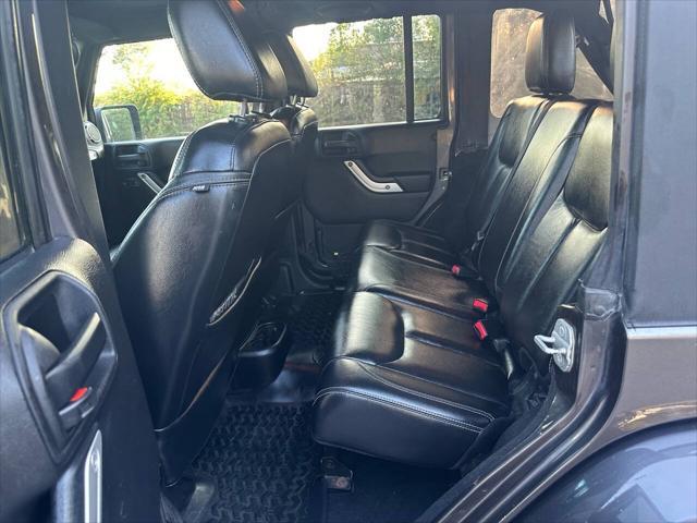 used 2014 Jeep Wrangler Unlimited car, priced at $12,000