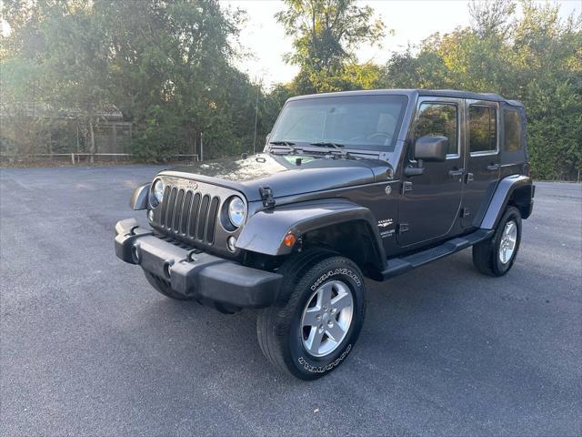 used 2014 Jeep Wrangler Unlimited car, priced at $12,000