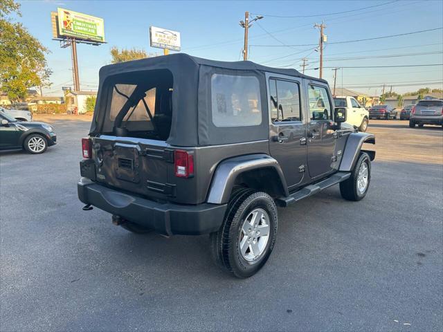 used 2014 Jeep Wrangler Unlimited car, priced at $12,000