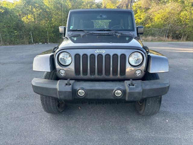 used 2014 Jeep Wrangler Unlimited car, priced at $12,000