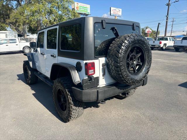 used 2013 Jeep Wrangler Unlimited car, priced at $16,500