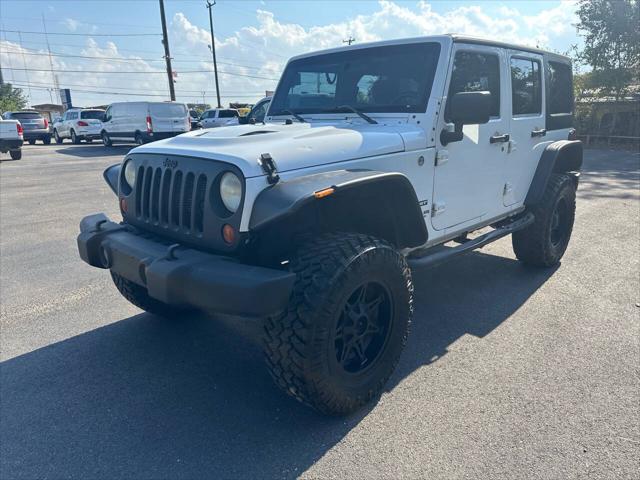 used 2013 Jeep Wrangler Unlimited car, priced at $16,500