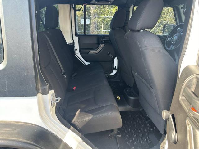 used 2013 Jeep Wrangler Unlimited car, priced at $16,500