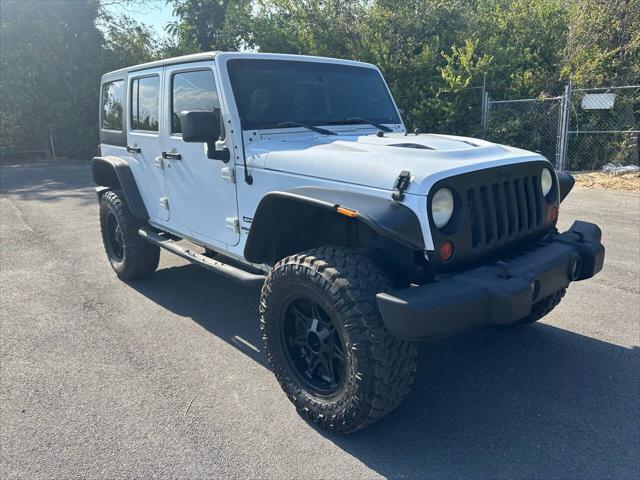 used 2013 Jeep Wrangler Unlimited car, priced at $16,500