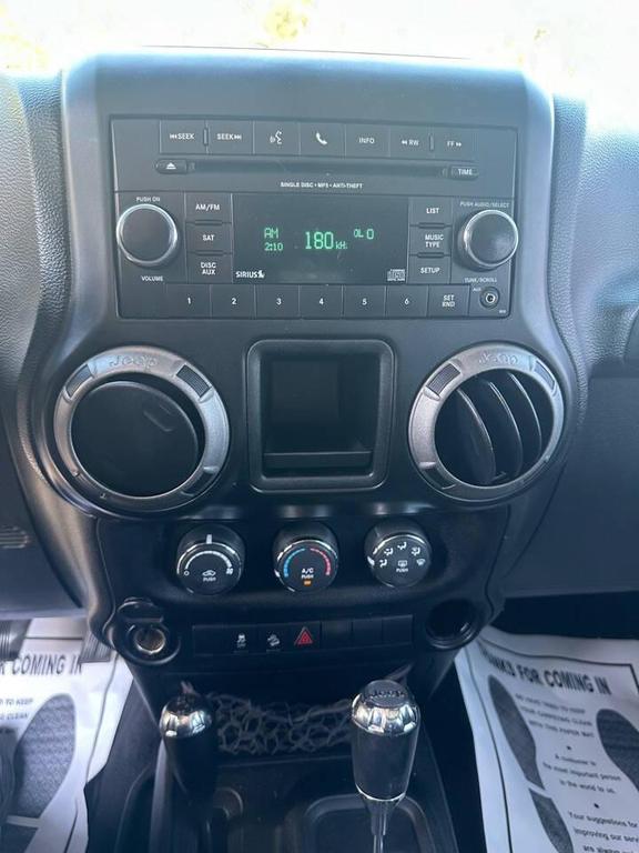 used 2013 Jeep Wrangler Unlimited car, priced at $15,900
