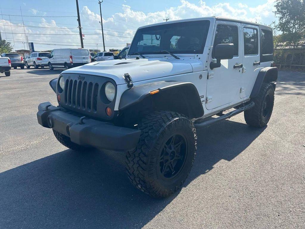used 2013 Jeep Wrangler Unlimited car, priced at $15,900