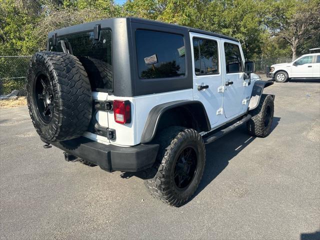 used 2013 Jeep Wrangler Unlimited car, priced at $16,500