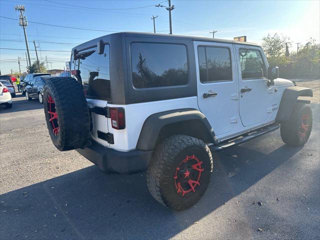 used 2014 Jeep Wrangler Unlimited car, priced at $16,000