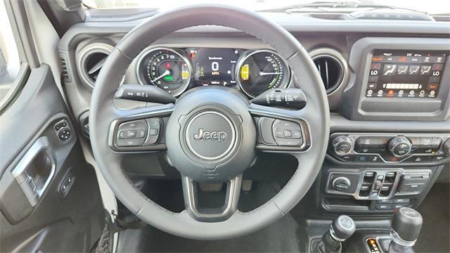used 2023 Jeep Wrangler 4xe car, priced at $27,991