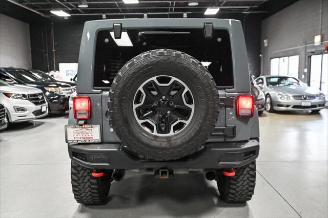 used 2013 Jeep Wrangler Unlimited car, priced at $20,985
