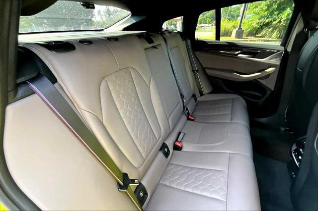used 2023 BMW X4 M car, priced at $69,498