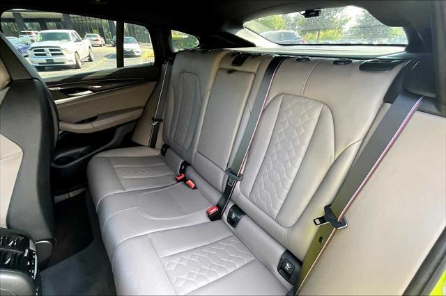 used 2023 BMW X4 M car, priced at $69,498