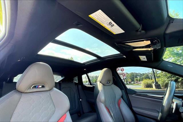 used 2023 BMW X4 M car, priced at $69,498