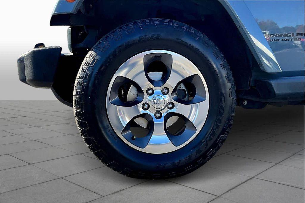 used 2015 Jeep Wrangler Unlimited car, priced at $16,498