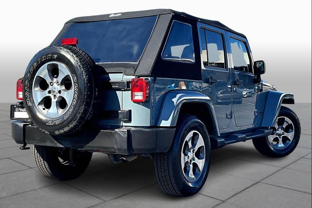 used 2015 Jeep Wrangler Unlimited car, priced at $16,498