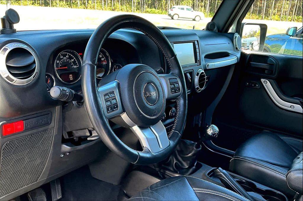 used 2014 Jeep Wrangler Unlimited car, priced at $19,900