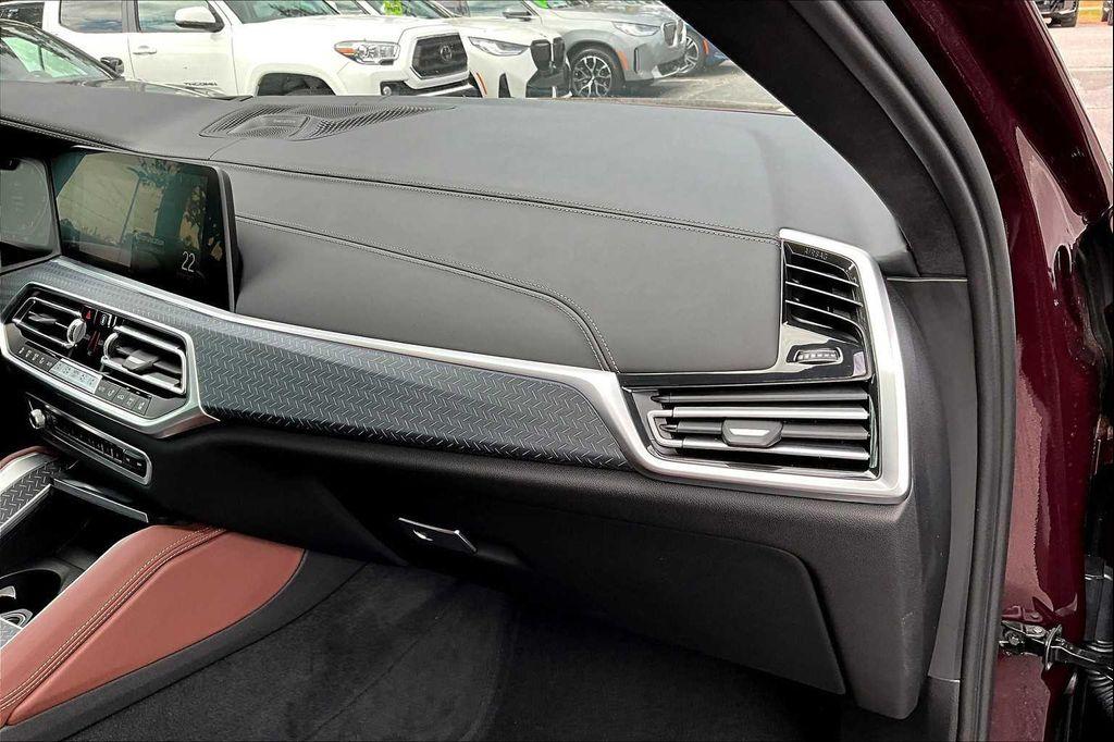 used 2023 BMW X6 car, priced at $67,340