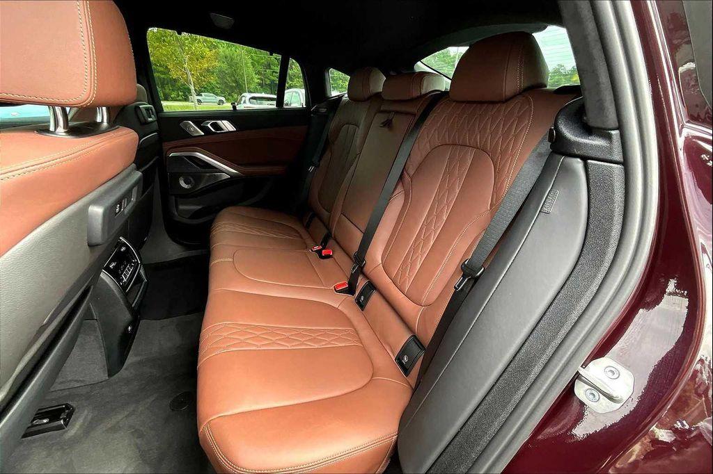used 2023 BMW X6 car, priced at $67,340