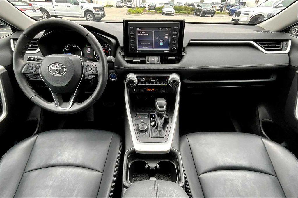 used 2021 Toyota RAV4 Hybrid car, priced at $27,300
