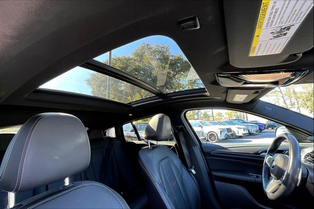 used 2023 BMW X4 car, priced at $49,356