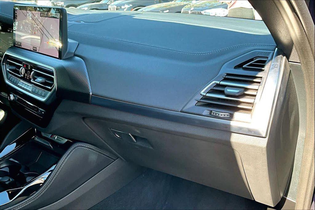 used 2023 BMW X4 car, priced at $49,356