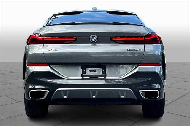 used 2024 BMW X6 car, priced at $68,900