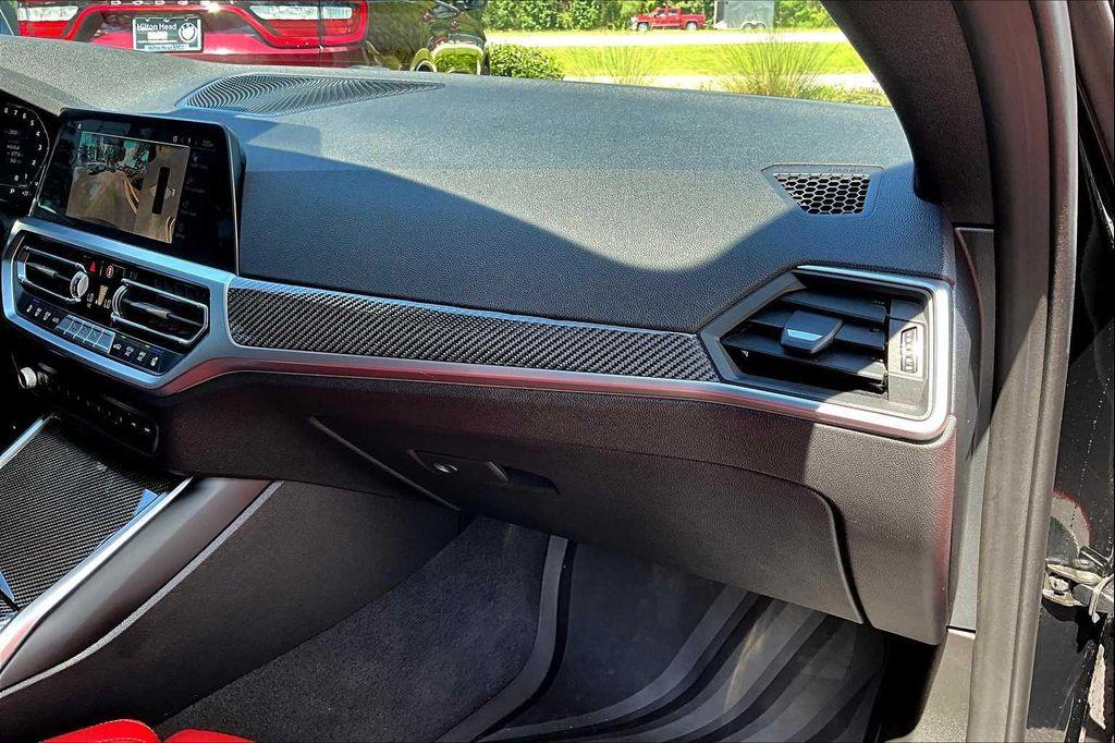 used 2023 BMW M4 car, priced at $76,700