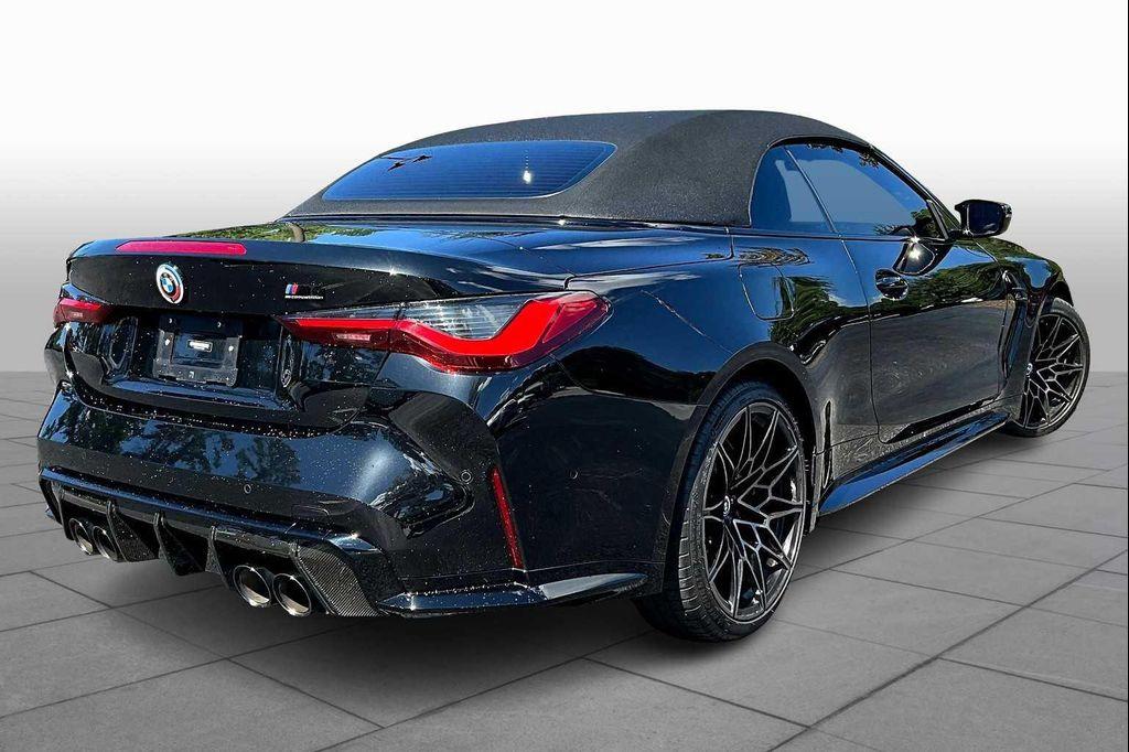 used 2023 BMW M4 car, priced at $76,700