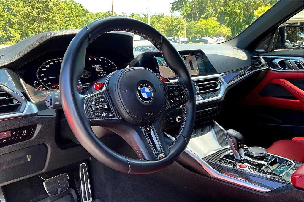 used 2023 BMW M4 car, priced at $76,700