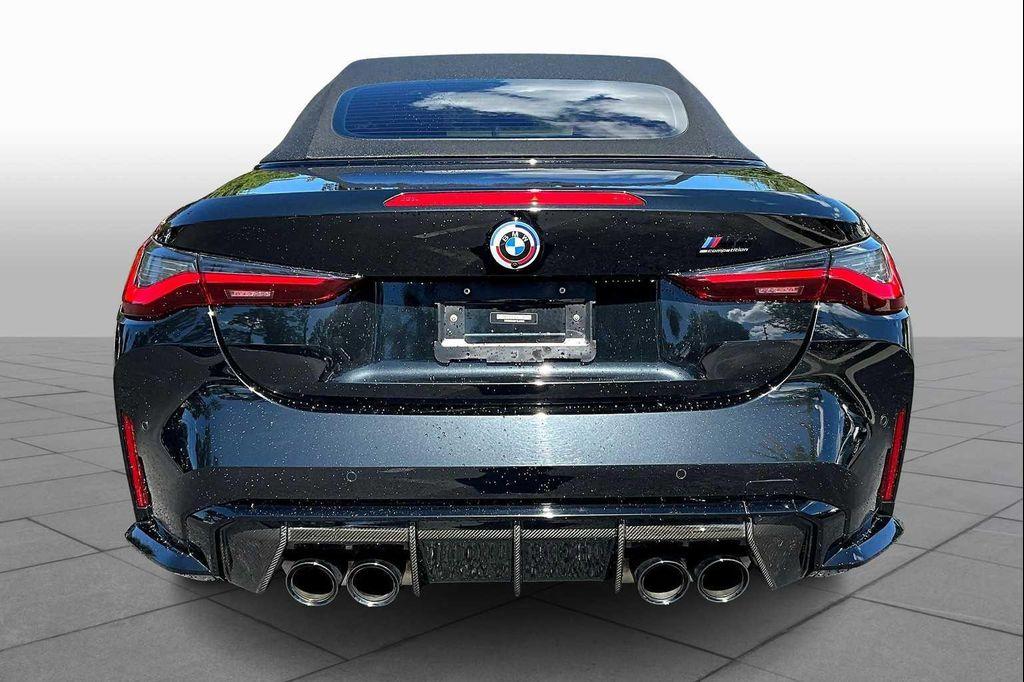 used 2023 BMW M4 car, priced at $76,700