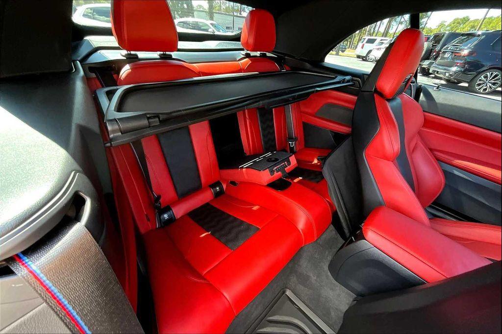 used 2023 BMW M4 car, priced at $76,700