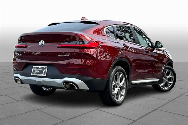 used 2025 BMW X4 car, priced at $55,300