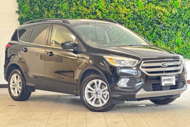 used 2018 Ford Escape car, priced at $15,285