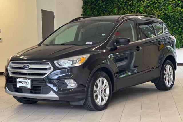 used 2018 Ford Escape car, priced at $15,285