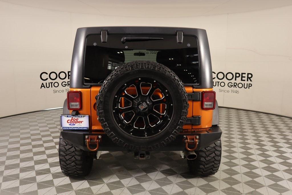 used 2011 Jeep Wrangler Unlimited car, priced at $14,997