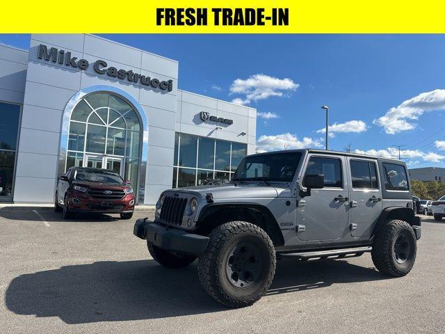 used 2014 Jeep Wrangler Unlimited car, priced at $18,315