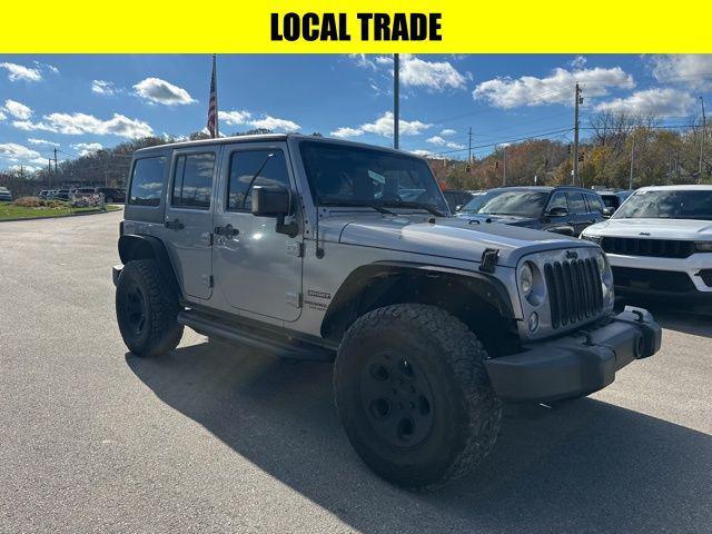 used 2014 Jeep Wrangler Unlimited car, priced at $18,315