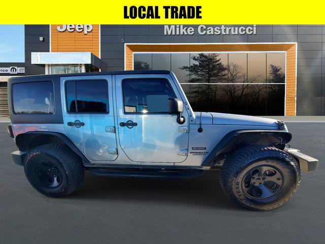 used 2014 Jeep Wrangler Unlimited car, priced at $17,634