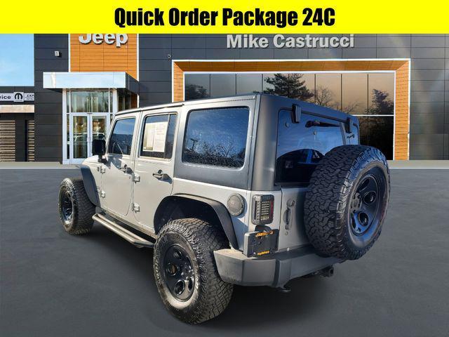 used 2014 Jeep Wrangler Unlimited car, priced at $17,634