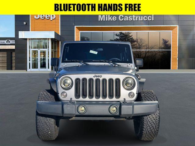 used 2014 Jeep Wrangler Unlimited car, priced at $17,634