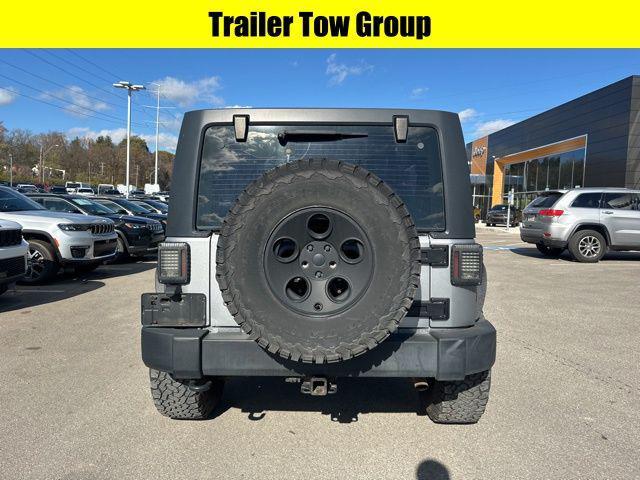 used 2014 Jeep Wrangler Unlimited car, priced at $18,315