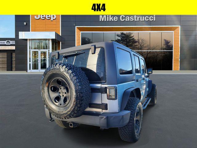 used 2014 Jeep Wrangler Unlimited car, priced at $17,634