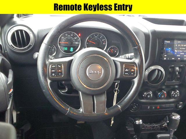 used 2012 Jeep Wrangler Unlimited car, priced at $14,900