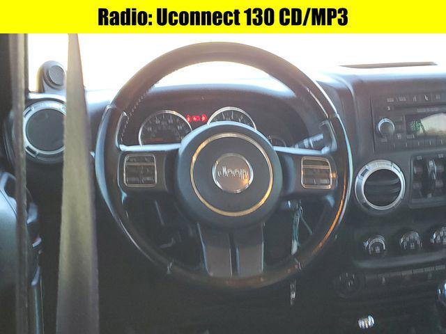 used 2012 Jeep Wrangler Unlimited car, priced at $10,875