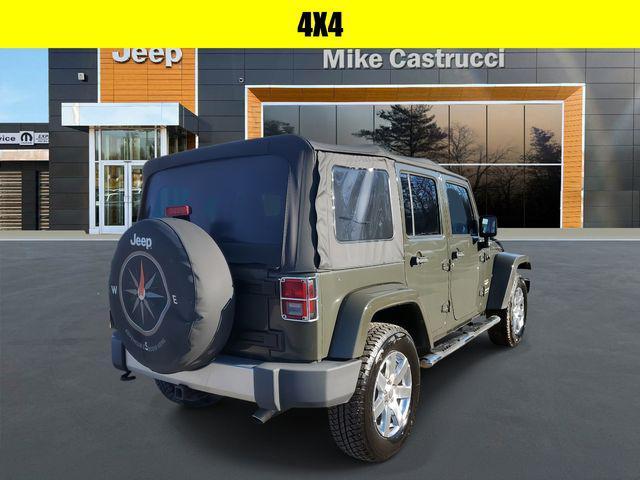 used 2015 Jeep Wrangler Unlimited car, priced at $22,443