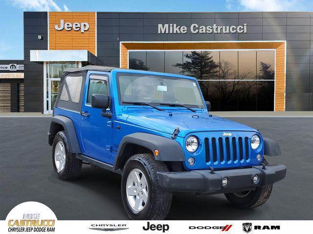 used 2015 Jeep Wrangler car, priced at $14,140