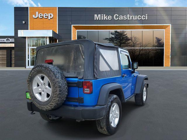 used 2015 Jeep Wrangler car, priced at $14,140